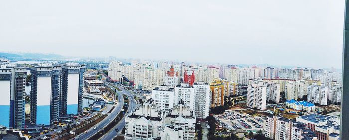Panoramic shot of cityscape against sky