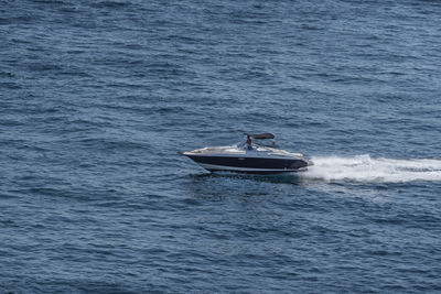 Boat sailing in sea