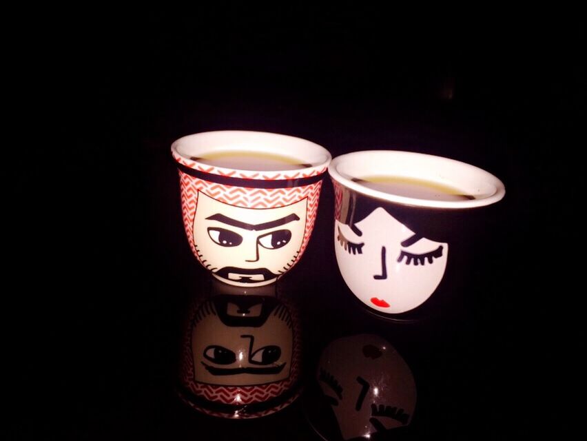 black background, cup, indoors, lighting, drink, food and drink, still life, no people, studio shot, coffee cup, refreshment, mug, close-up, group of objects