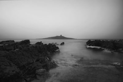 Scenic view of sea against clear sky