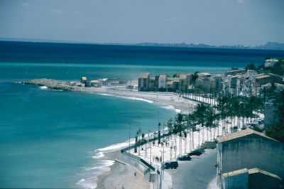 Panoramic view of sea against blue sky