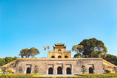 View of historical building against clear blue sky