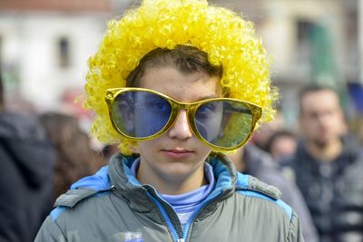 Portrait of young woman wearing sunglasses