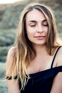 Close-up of smiling woman outdoors