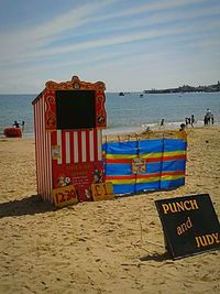 Scenic view of beach against blue sky