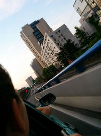 Cropped image of people on road