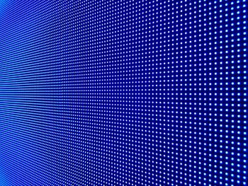 Close-up of illuminated blue led lights at night