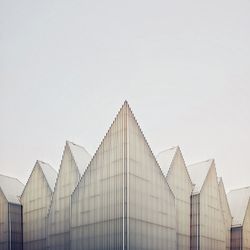 Low angle view of buildings against clear sky