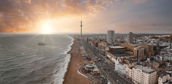 High angle view of city at sunset