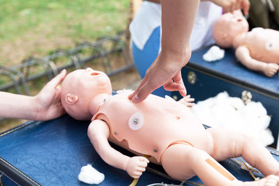 Midsection of man lying down on hands