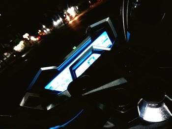 Close-up of illuminated lighting equipment