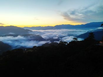 Scenic view of mountains against sky during sunset