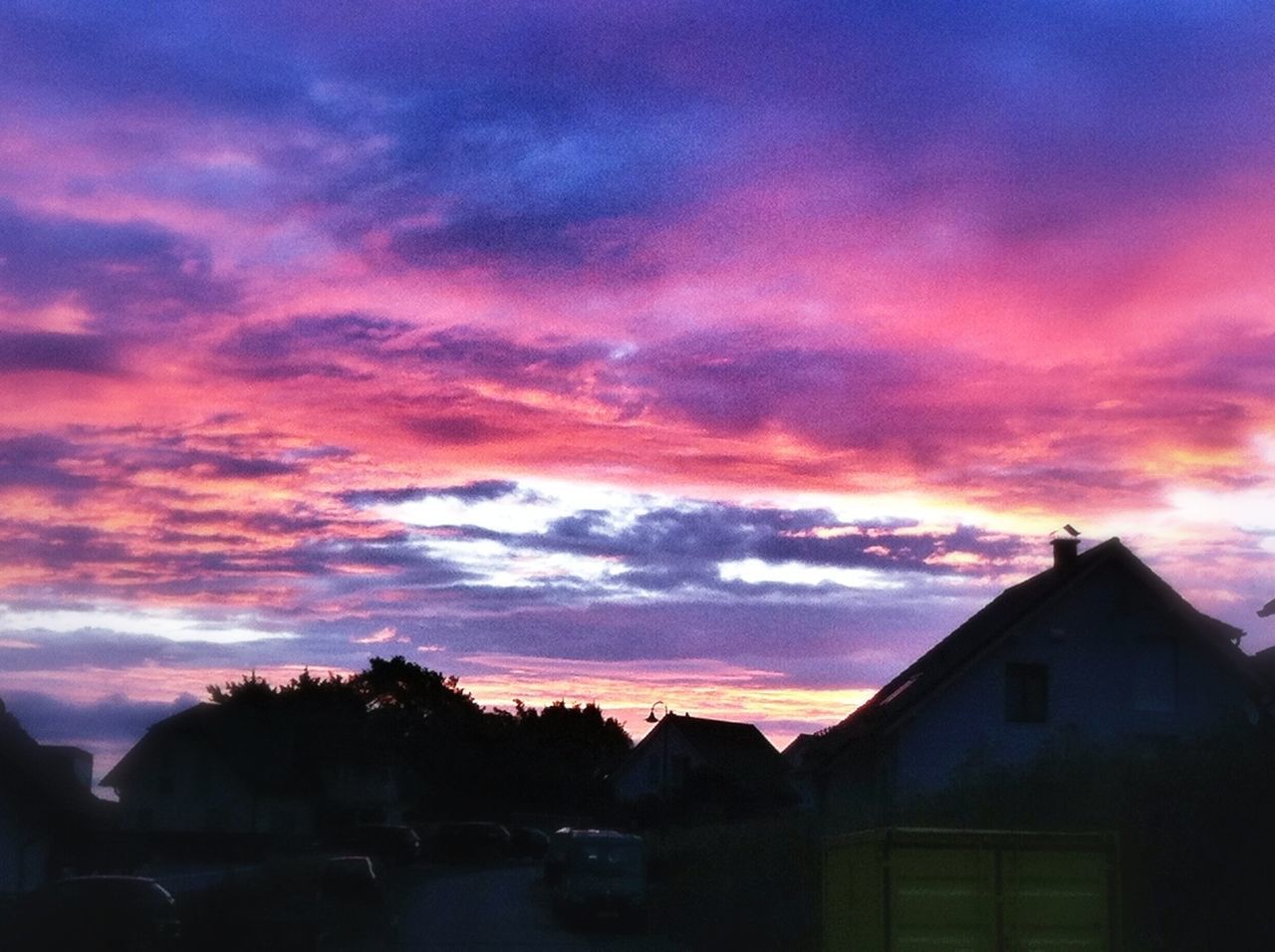 sunset, building exterior, sky, architecture, built structure, silhouette, orange color, cloud - sky, house, dramatic sky, beauty in nature, tree, cloud, scenics, cloudy, residential structure, nature, dusk, outdoors, moody sky