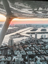 Aerial view of buildings in city during winter