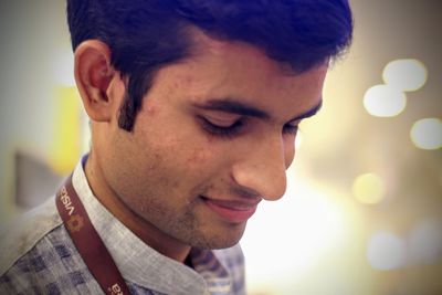 Close-up portrait of young man smiling