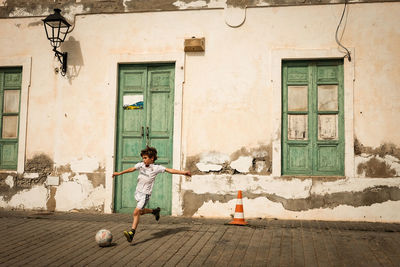 Boy playing with ball