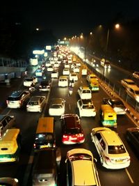 Traffic on road in city at night