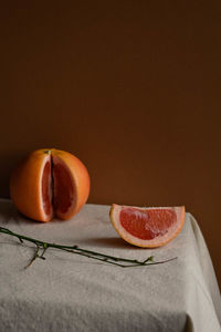 Close-up of oranges on table