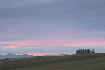 Scenic view of landscape against sky during sunset