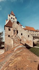 Low angle view of old building against sky