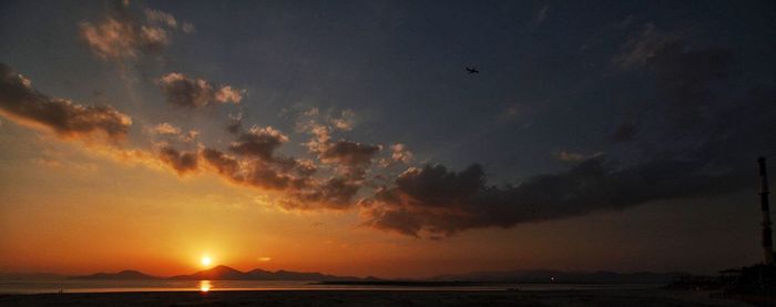 Scenic view of sea at sunset