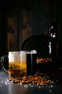 Close-up of beer glass on table