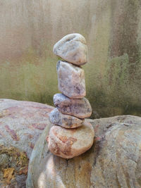 Close-up of stone stack on rock