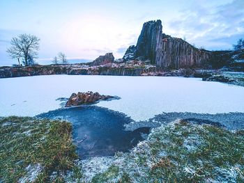 Scenic view of sea against sky during winter