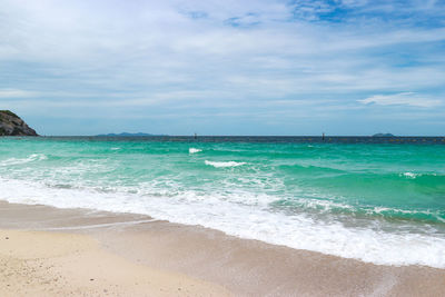 Scenic view of beach against sky