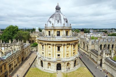 High angle view of historical building against cloudy sky