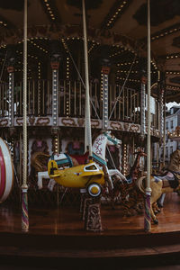 Carousel in amusement park at night