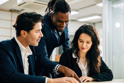 Business colleagues working in office