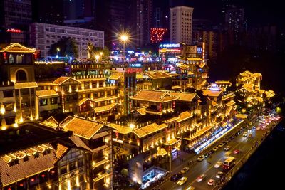 High angle view of illuminated buildings in city