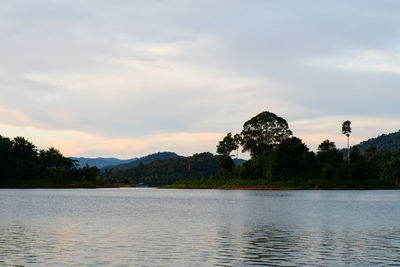 Scenic view of lake against sky during sunset