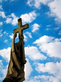 Low angle view of statue against sky