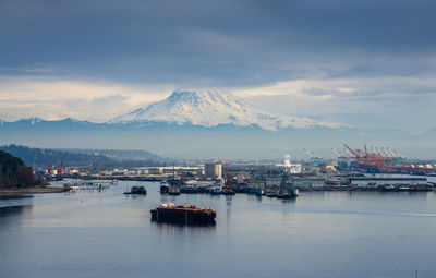 A view of the port of tacoma and mount rainier in washington state.