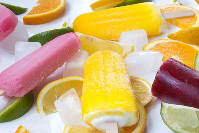 High angle view of multi colored candies in plate