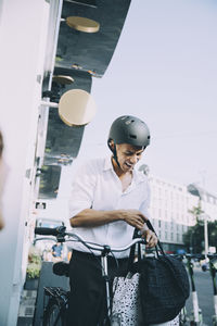 Portrait of man riding bicycle