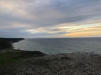 Scenic view of sea against sky during sunset