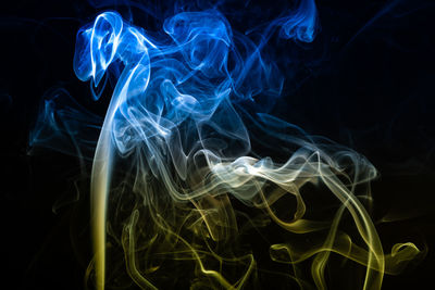 Close-up of smoke against black background