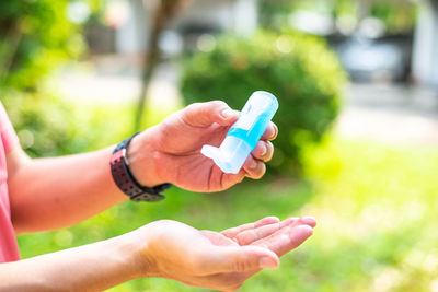 Close-up of woman holding hands