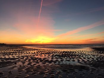 Scenic view of sea at sunset