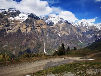 Scenic view of snowcapped mountains against sky