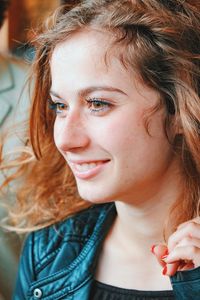 Close-up portrait of a girl looking away