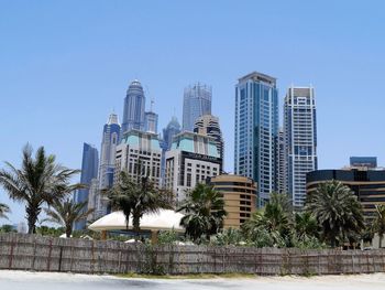 View of skyscrapers against clear sky