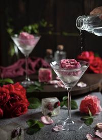 Close-up of rose drink on table