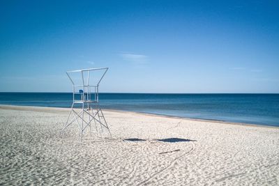 Scenic view of beach against clear sky