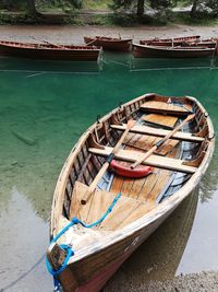 High angle view of fishing boats moored in lake