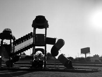 Low angle view of amusement park ride against sky