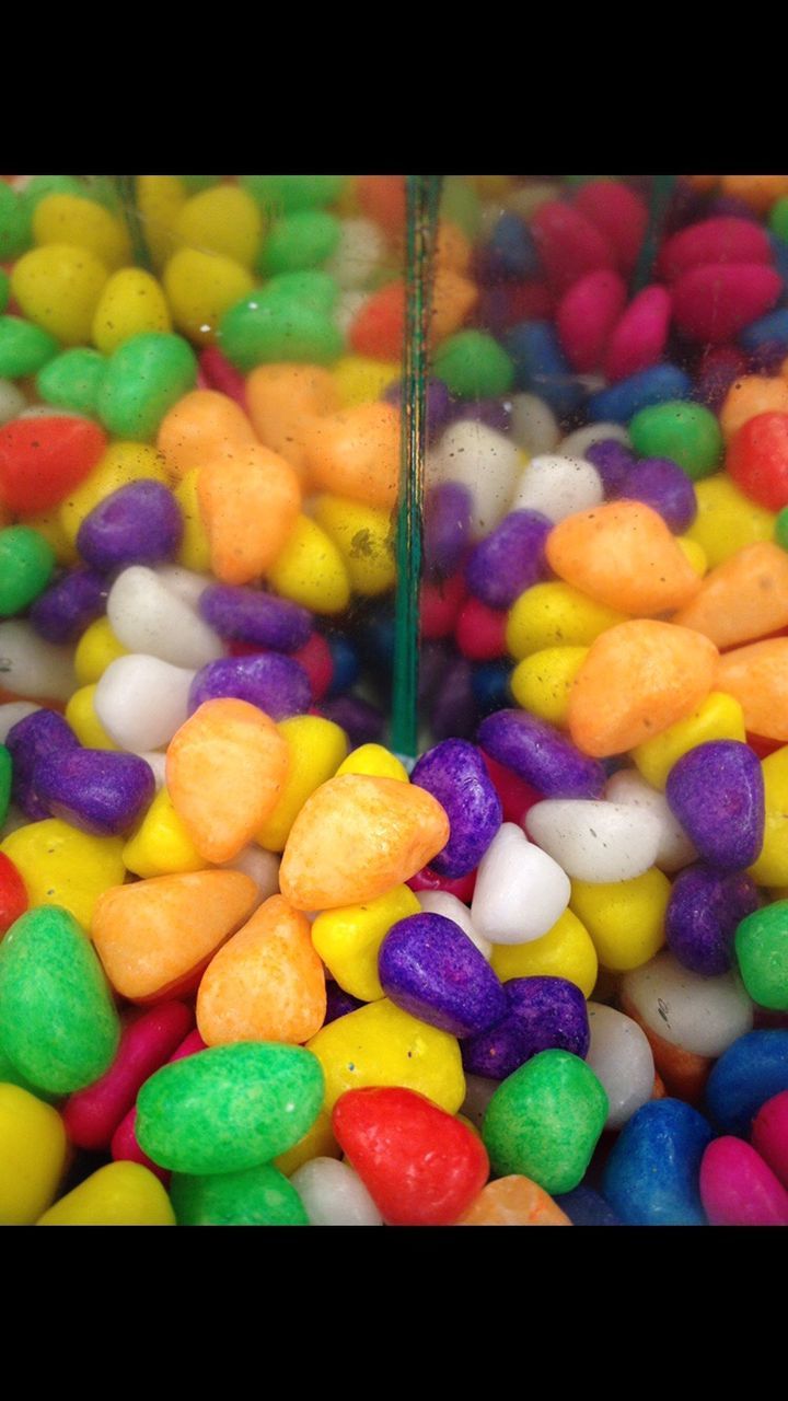 FULL FRAME SHOT OF MULTI COLORED CANDIES FOR SALE AT MARKET STALL